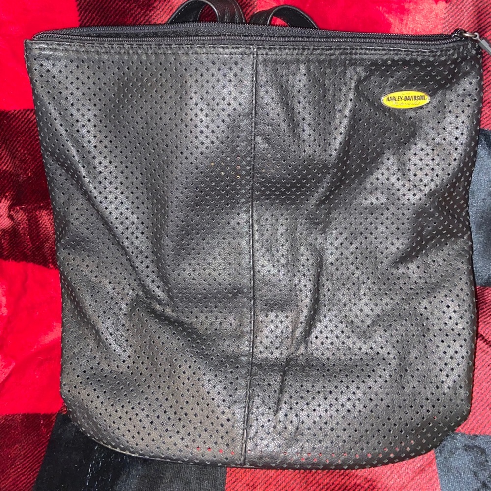 Perforated leather backpack purse